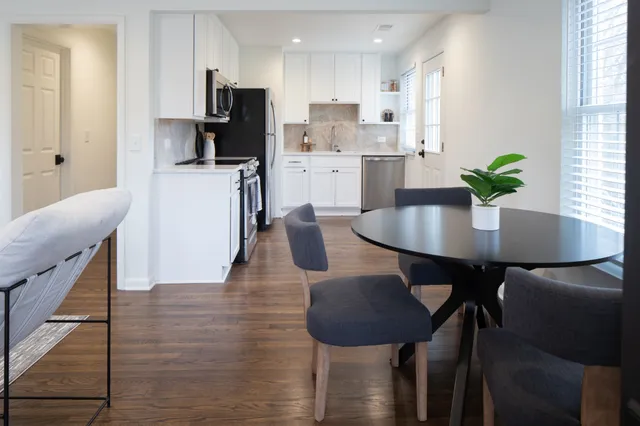 a view of a dining room with furniture