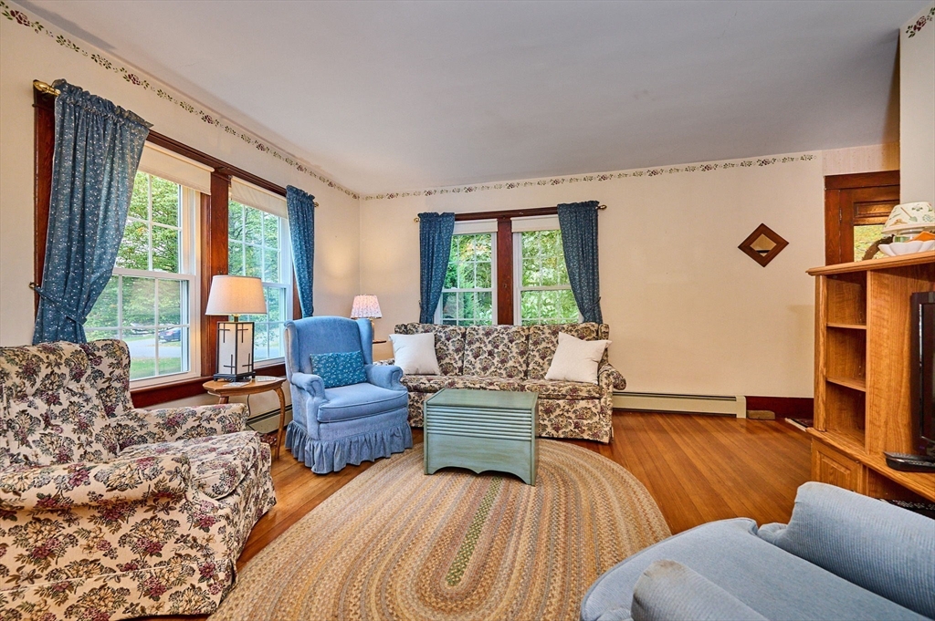 102 Elm Street Buckland, MA 01370 - Photo 13 of 35 a living room with furniture and a flat screen tv