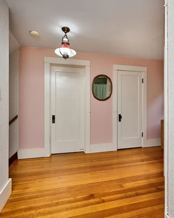 a view of a livingroom with wooden floor