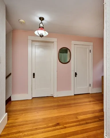 a view of a livingroom with wooden floor