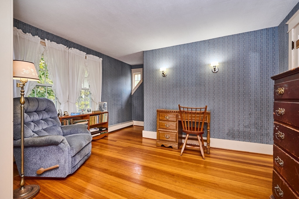 102 Elm Street Buckland, MA 01370 - Photo 21 of 35 a living room with furniture and a wooden floor