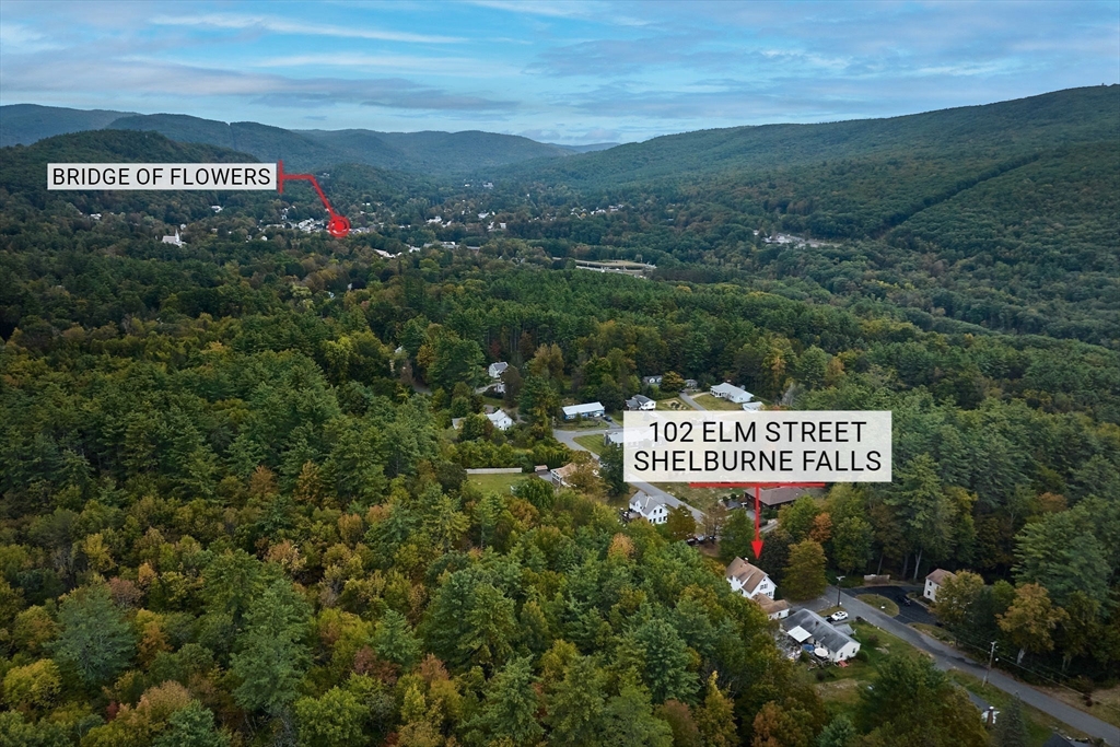 102 Elm Street Buckland, MA 01370 - Photo 4 of 35 a sign that is sitting on a brick wall