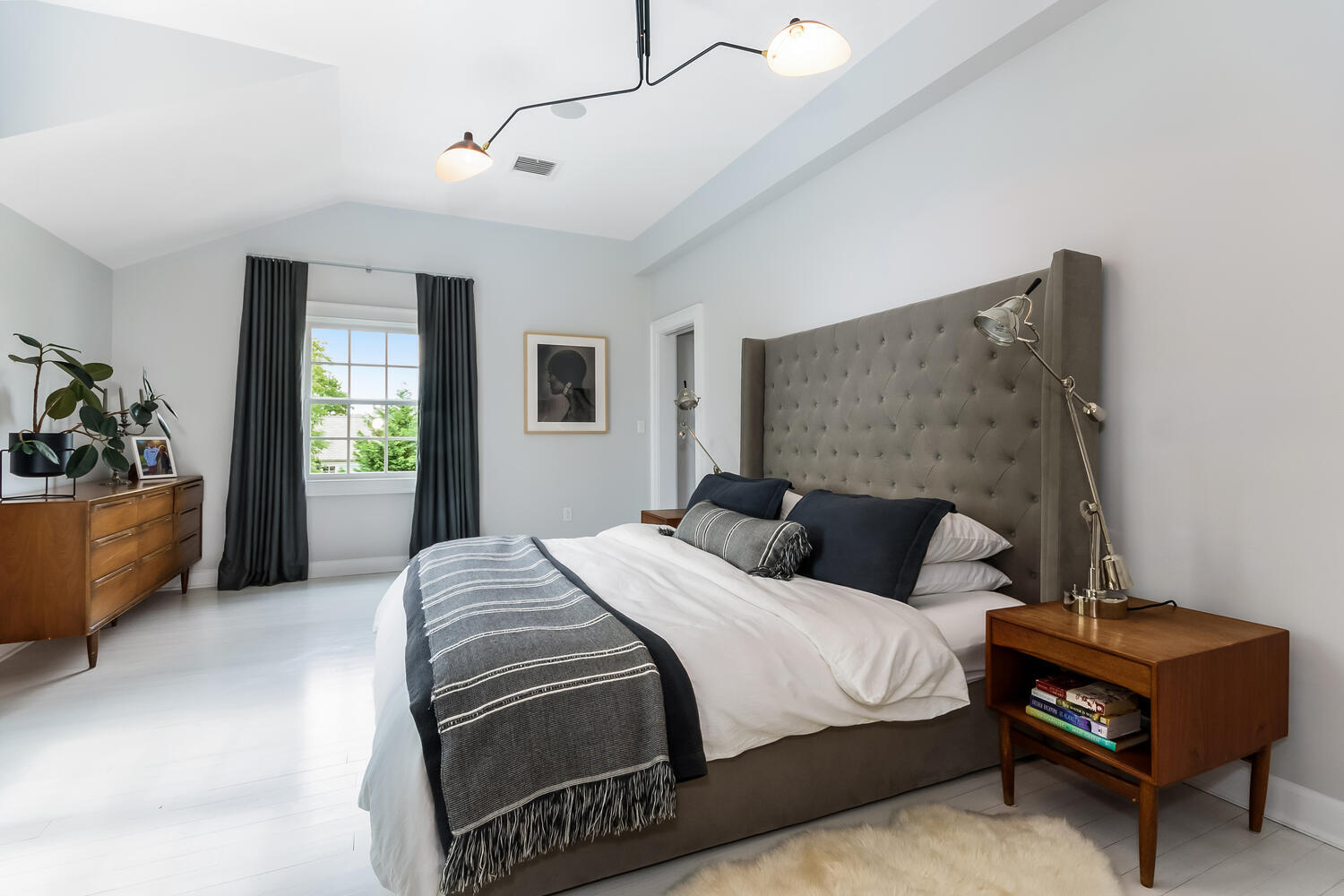 16 Mayflower Road Darien, CT 06820 - Photo 12 of 35 a bedroom with a bed and a couch
