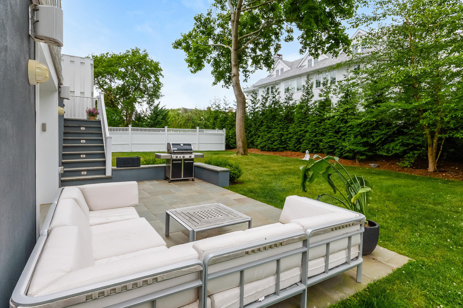 16 Mayflower Road Darien, CT 06820 - Photo 24 of 35 a view of backyard with seating area and green space