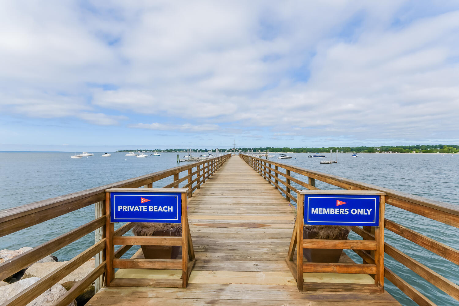 16 Mayflower Road Darien, CT 06820 - Photo 26 of 35 a view of a sign board with an ocean view