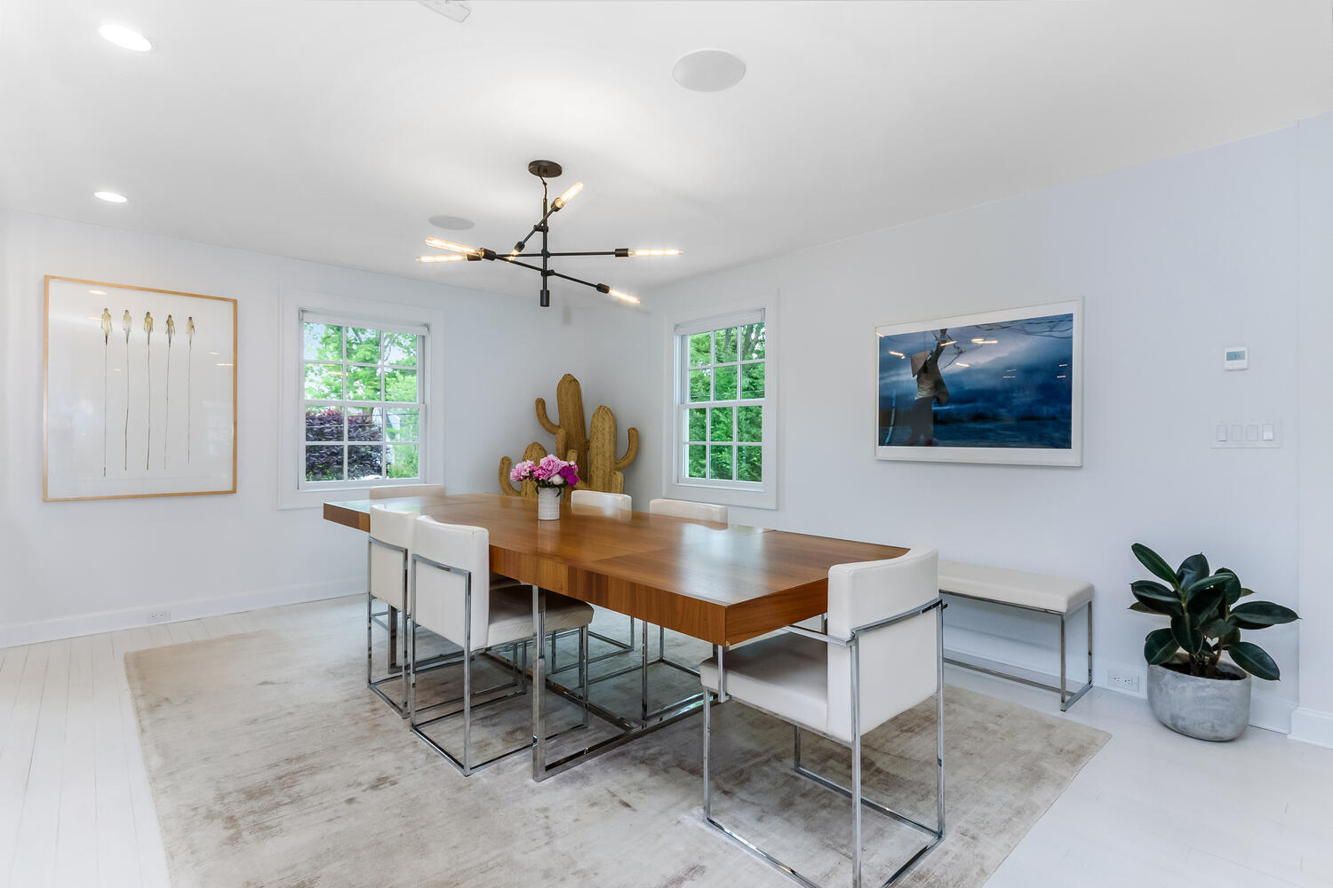 16 Mayflower Road Darien, CT 06820 - Photo 7 of 35 a view of a dining room with furniture and a potted plant