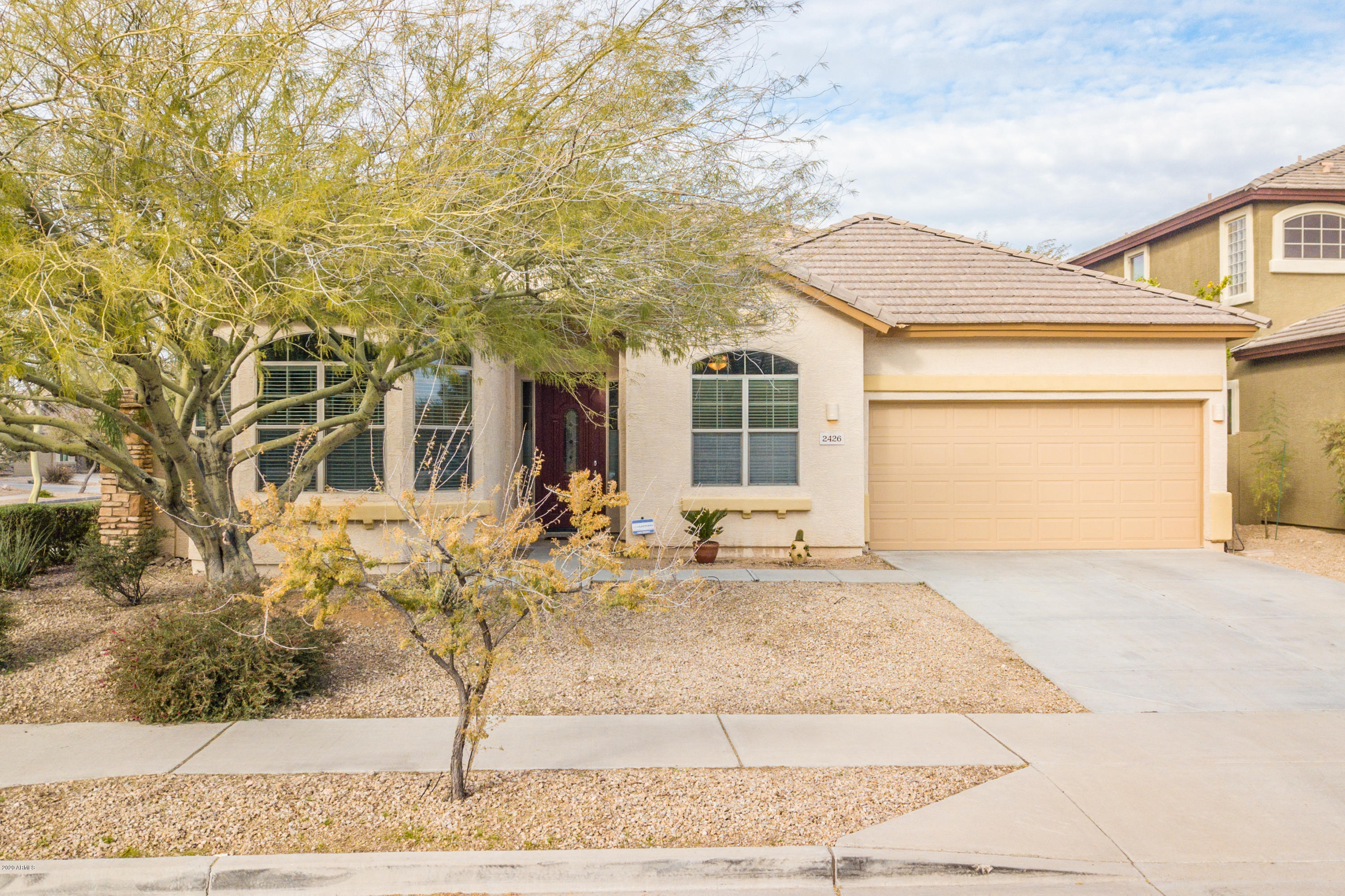 2426 West Apache Rain Road Phoenix, AZ 85085 - Photo 1 of 27 a view of a house with snow