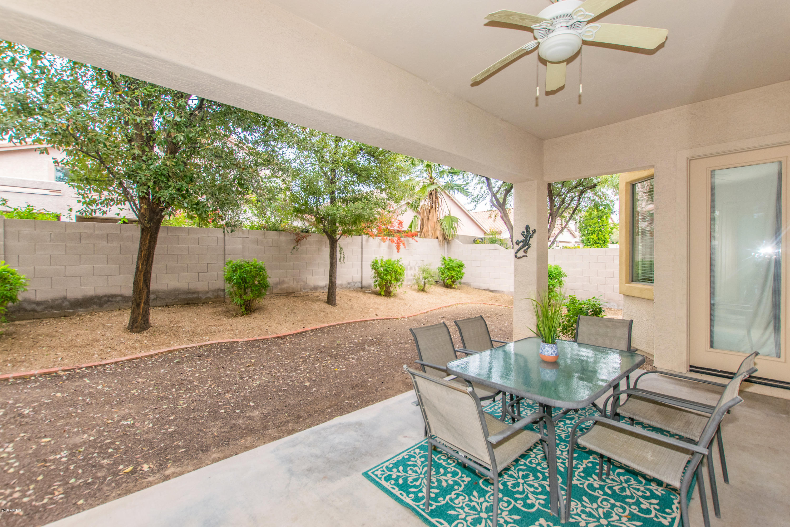 2426 West Apache Rain Road Phoenix, AZ 85085 - Photo 23 of 27 a view of a dining room with furniture window and outside view