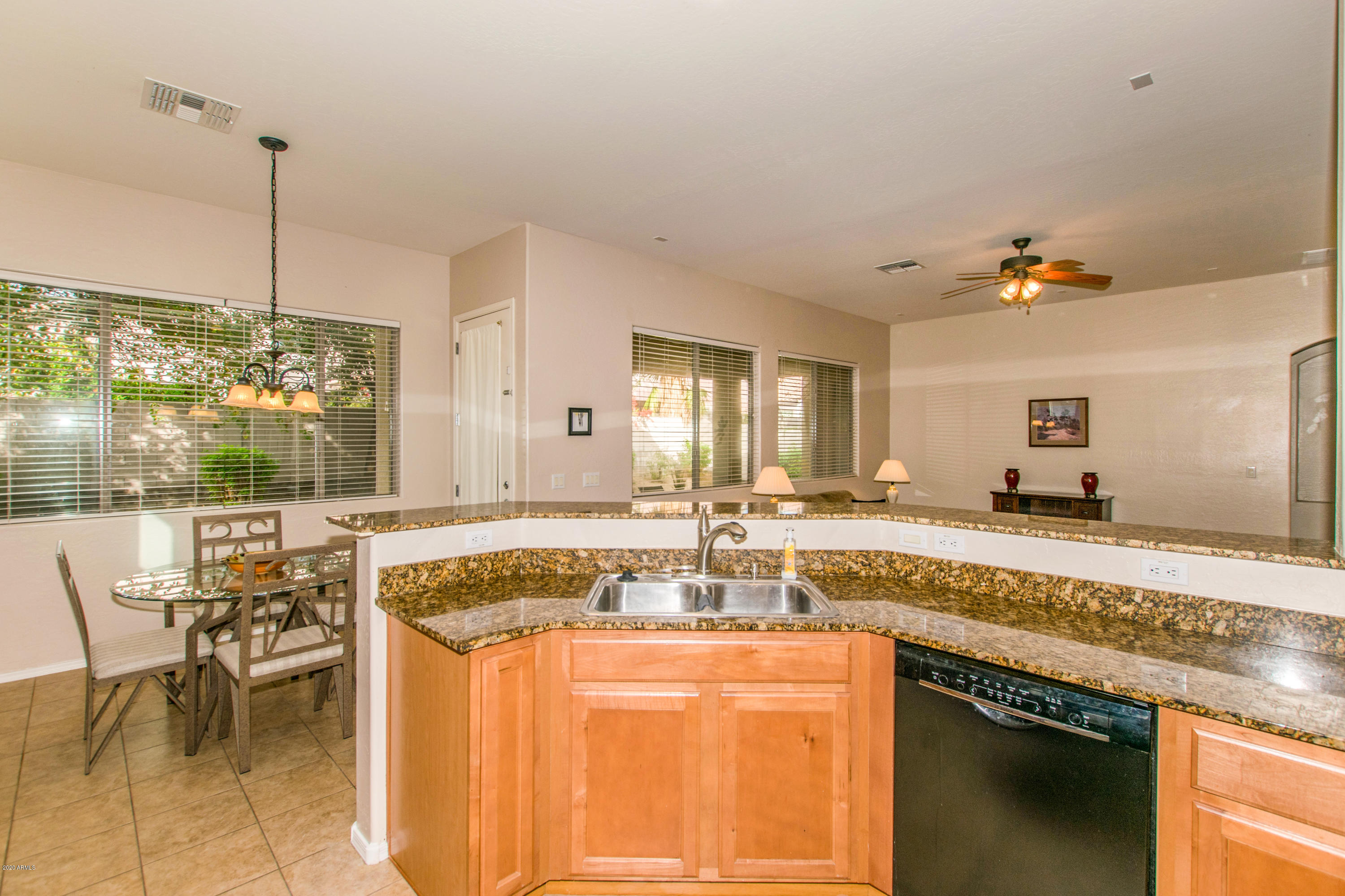 2426 West Apache Rain Road Phoenix, AZ 85085 - Photo 6 of 27 a very nice looking kitchen with a large window