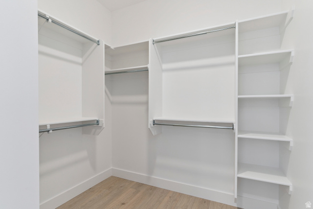 5777 West 4100 South Hooper, UT 84315 - Photo 14 of 41 Walk in closet with light wood-type flooring