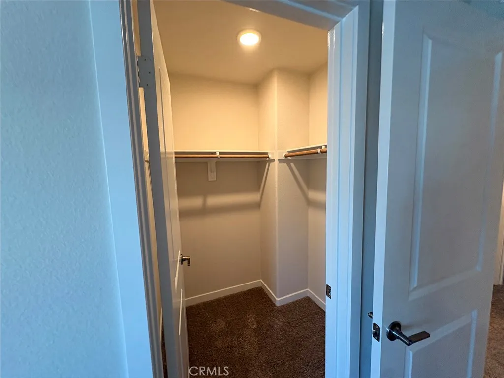 9511 Hannah Way Riverside, CA 92504 - Photo 20 of 28 Third level closet for bed 1