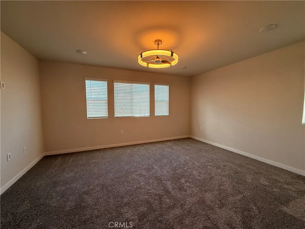 9511 Hannah Way Riverside, CA 92504 - Photo 24 of 28 Third level Primary Bedroom