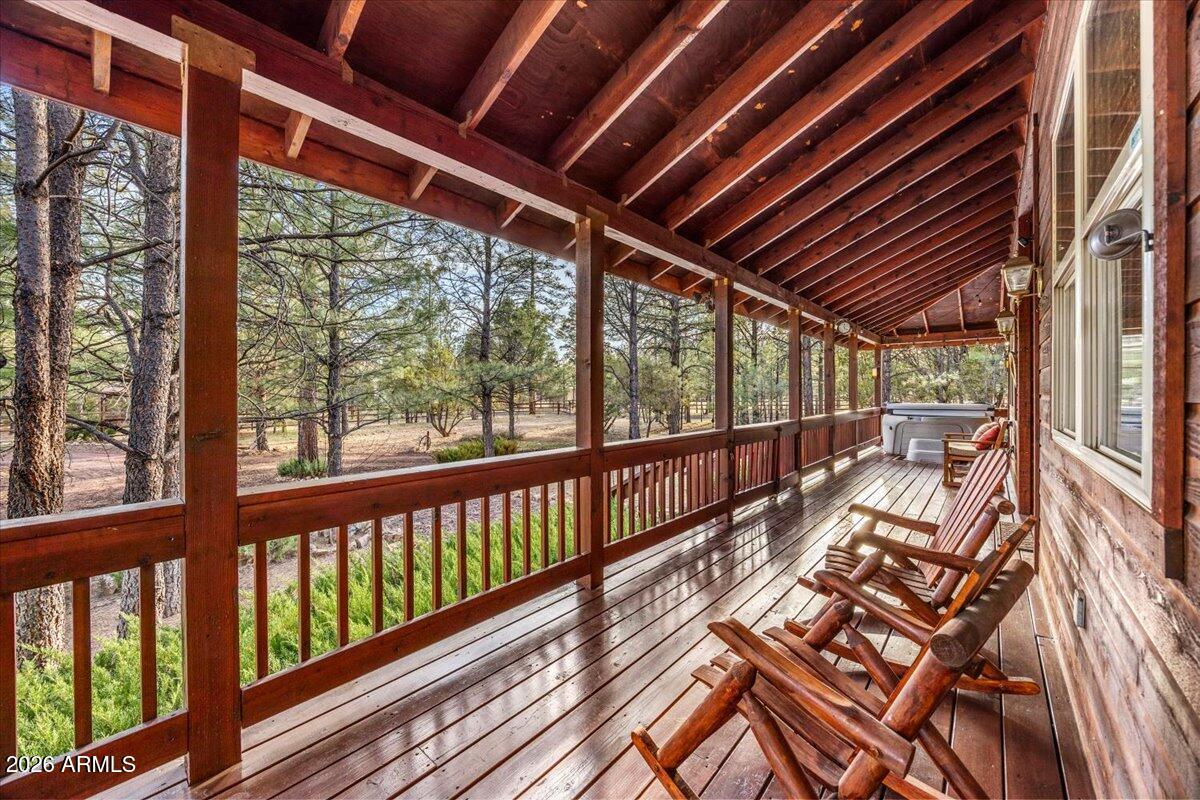 2952 Country View Lane Overgaard, AZ 85933 - Photo 9 of 81 a view of a balcony with wooden floor