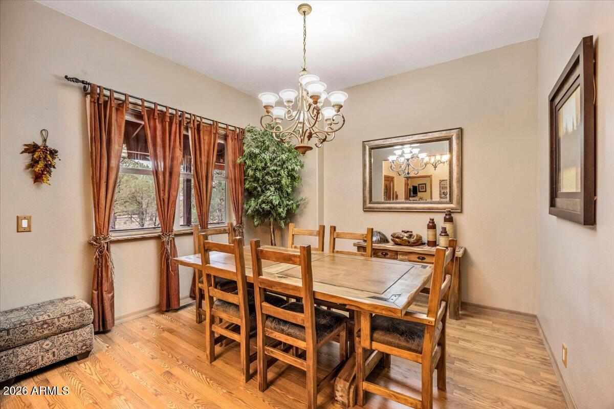 2952 Country View Lane Overgaard, AZ 85933 - Photo 13 of 81 a dining room with furniture and window