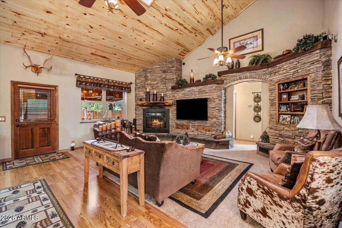 2952 Country View Lane Overgaard, AZ 85933 - Photo 16 of 81 a living room with furniture windows and a flat screen tv