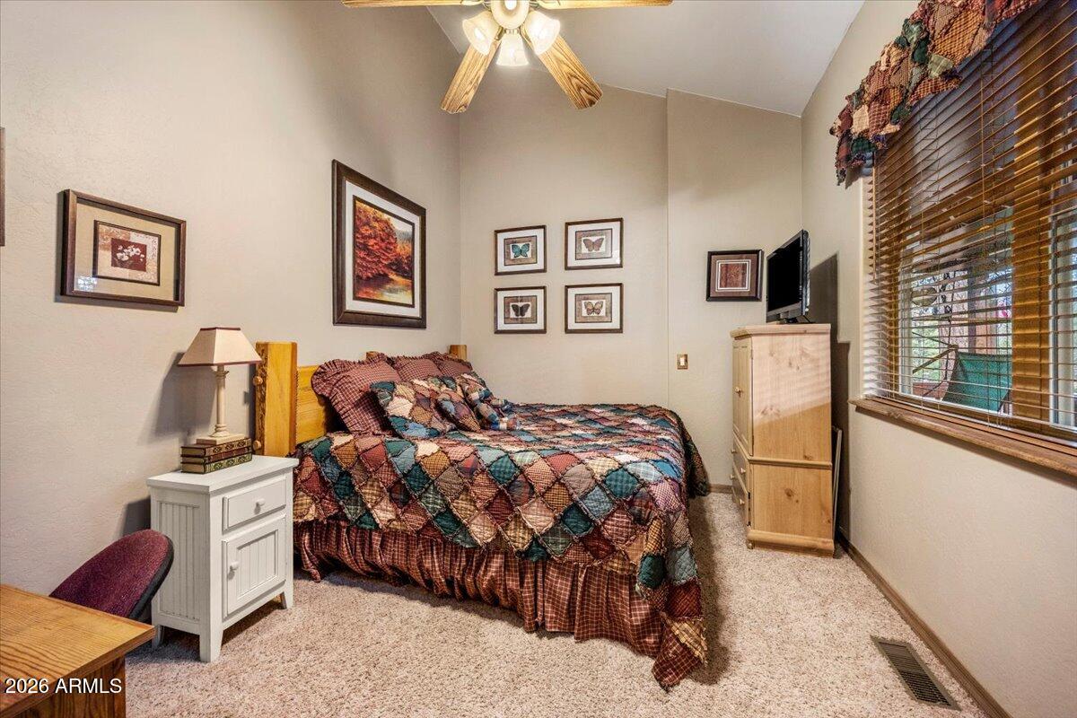 2952 Country View Lane Overgaard, AZ 85933 - Photo 29 of 81 a bed room with a bed and furniture
