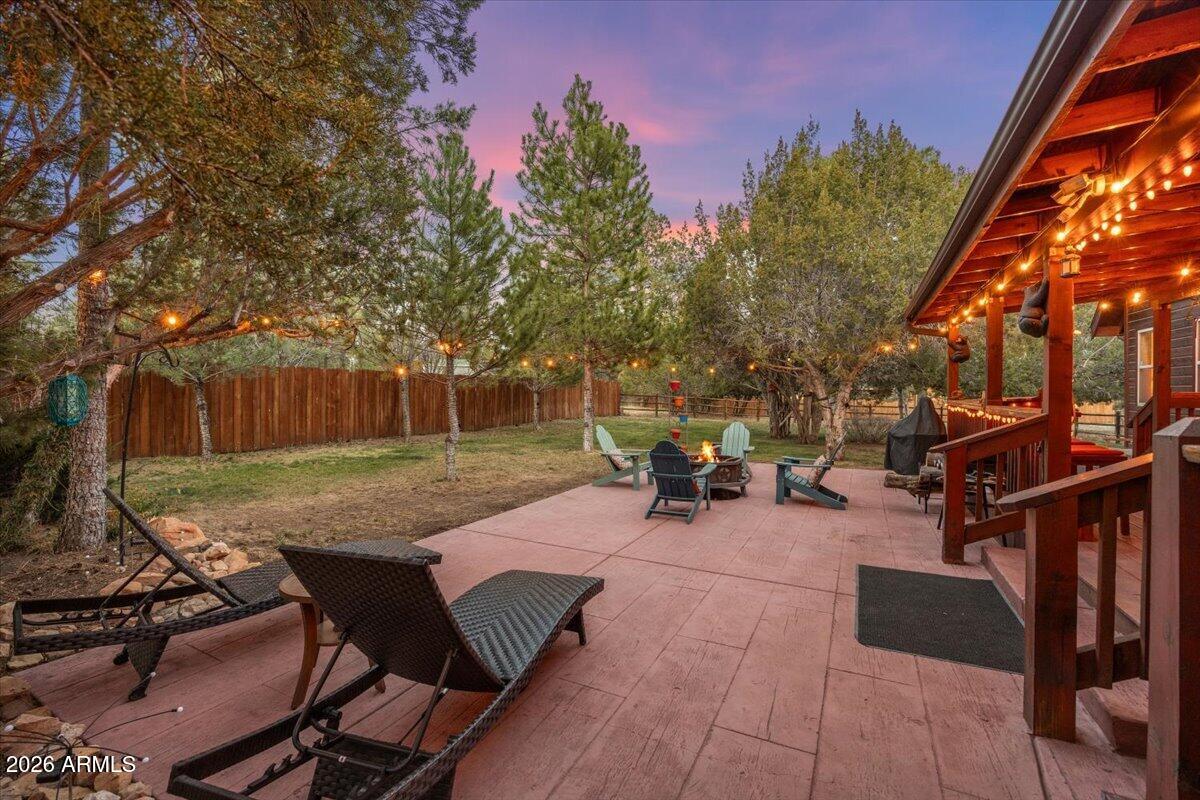 2952 Country View Lane Overgaard, AZ 85933 - Photo 44 of 81 a view of a backyard with sitting area