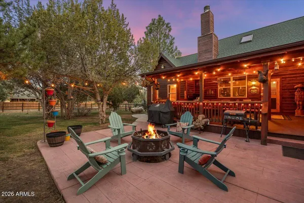 an aerial view of a house with outdoor space