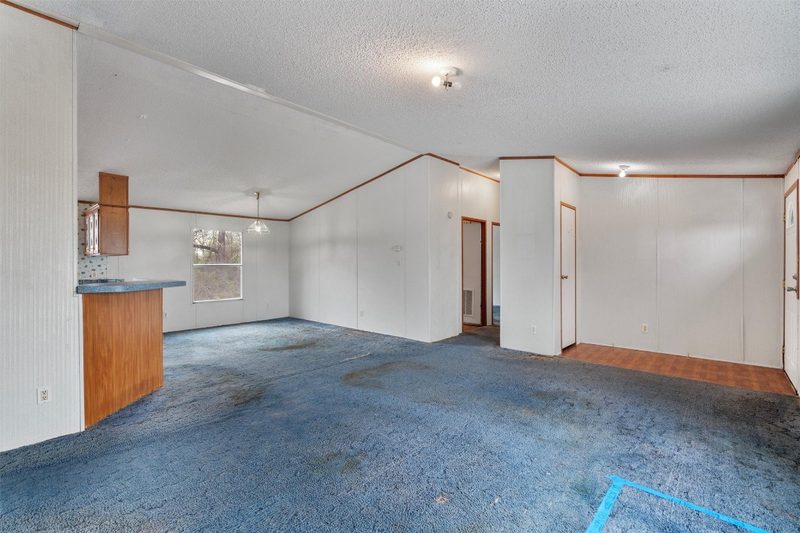 1100 County Road 474 Elgin, TX 78621 - Photo 13 of 40 a view of a big room with closet and wooden floor