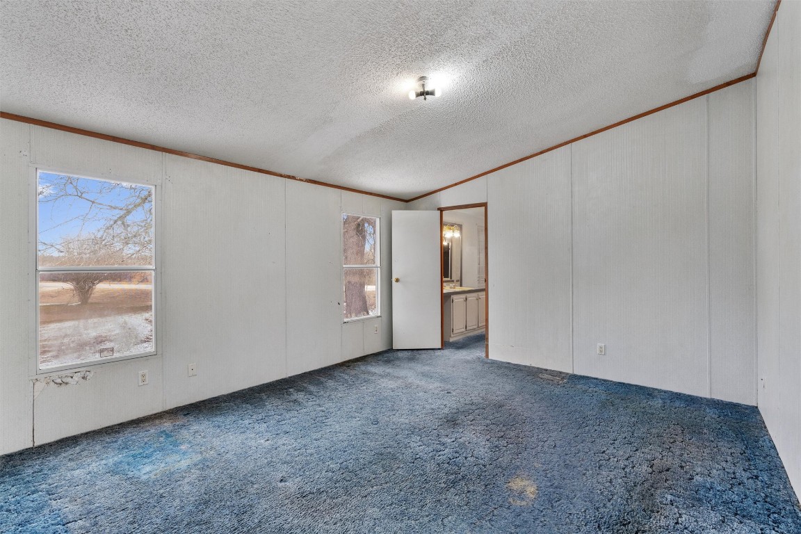 1100 County Road 474 Elgin, TX 78621 - Photo 21 of 40 a view of an empty room and window
