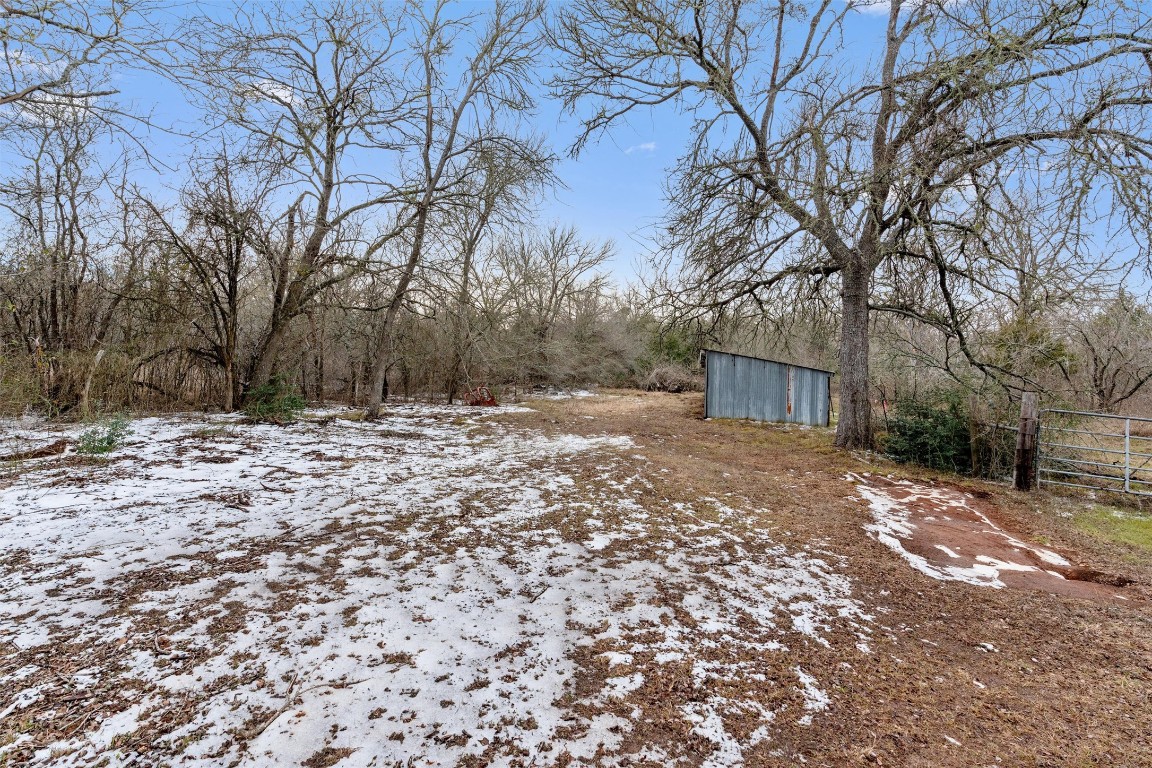1100 County Road 474 Elgin, TX 78621 - Photo 34 of 40 a view of a yard with trees