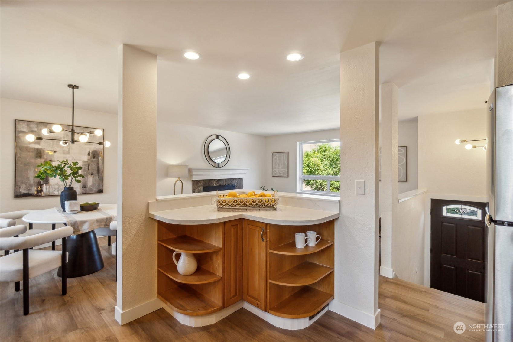 1901 Northeast 17th Place Renton, WA 98056 - Photo 13 of 40 a view of kitchen island with furniture and window