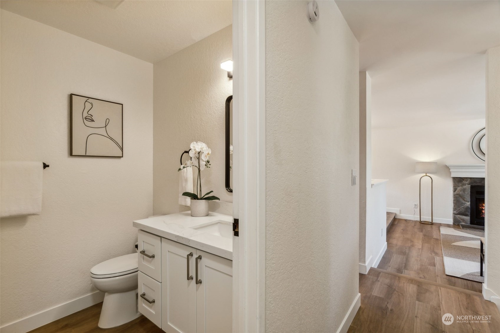 1901 Northeast 17th Place Renton, WA 98056 - Photo 15 of 40 a bathroom with a sink toilet and vanity