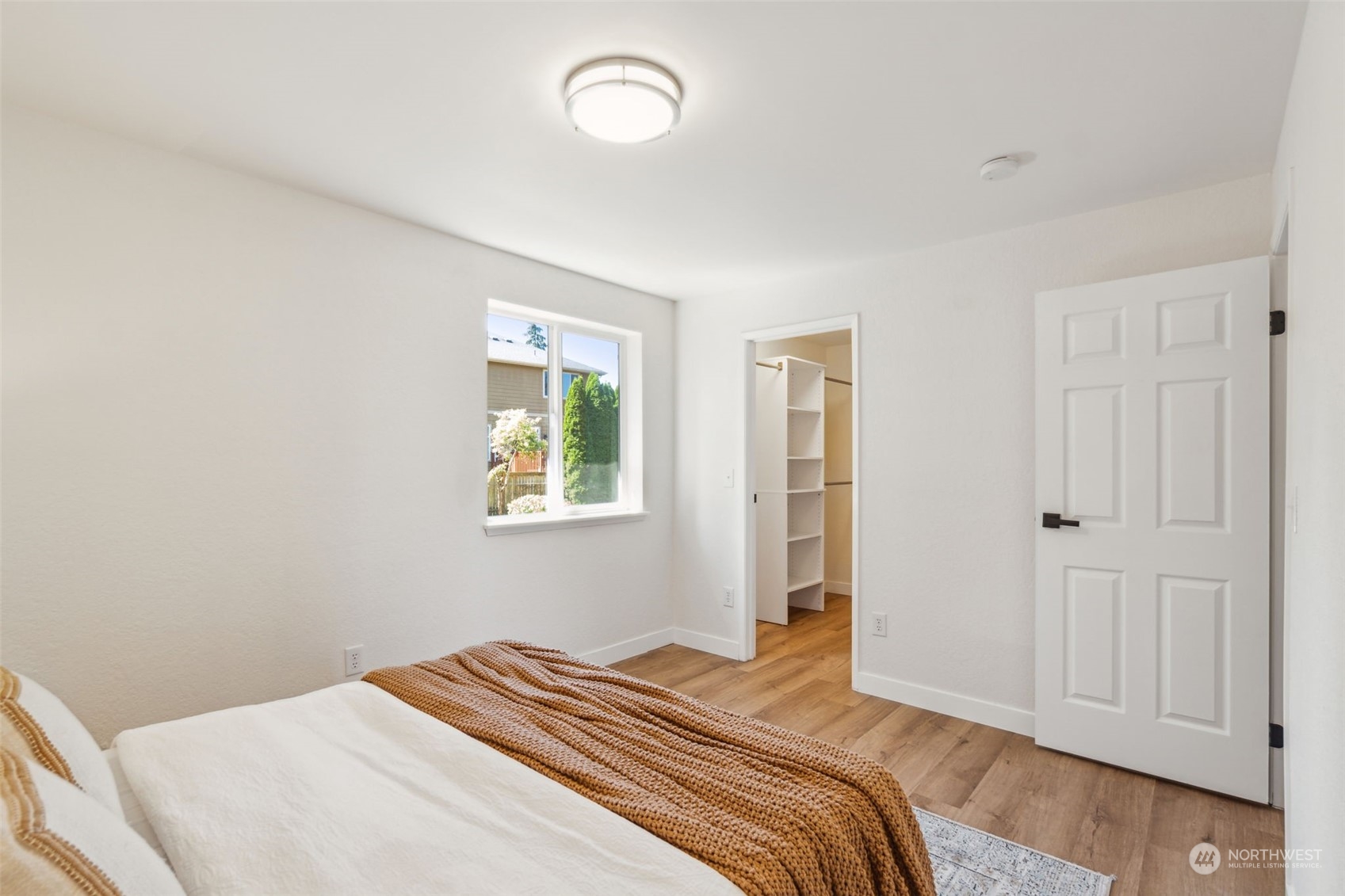 1901 Northeast 17th Place Renton, WA 98056 - Photo 19 of 40 a bedroom with a bed and a window