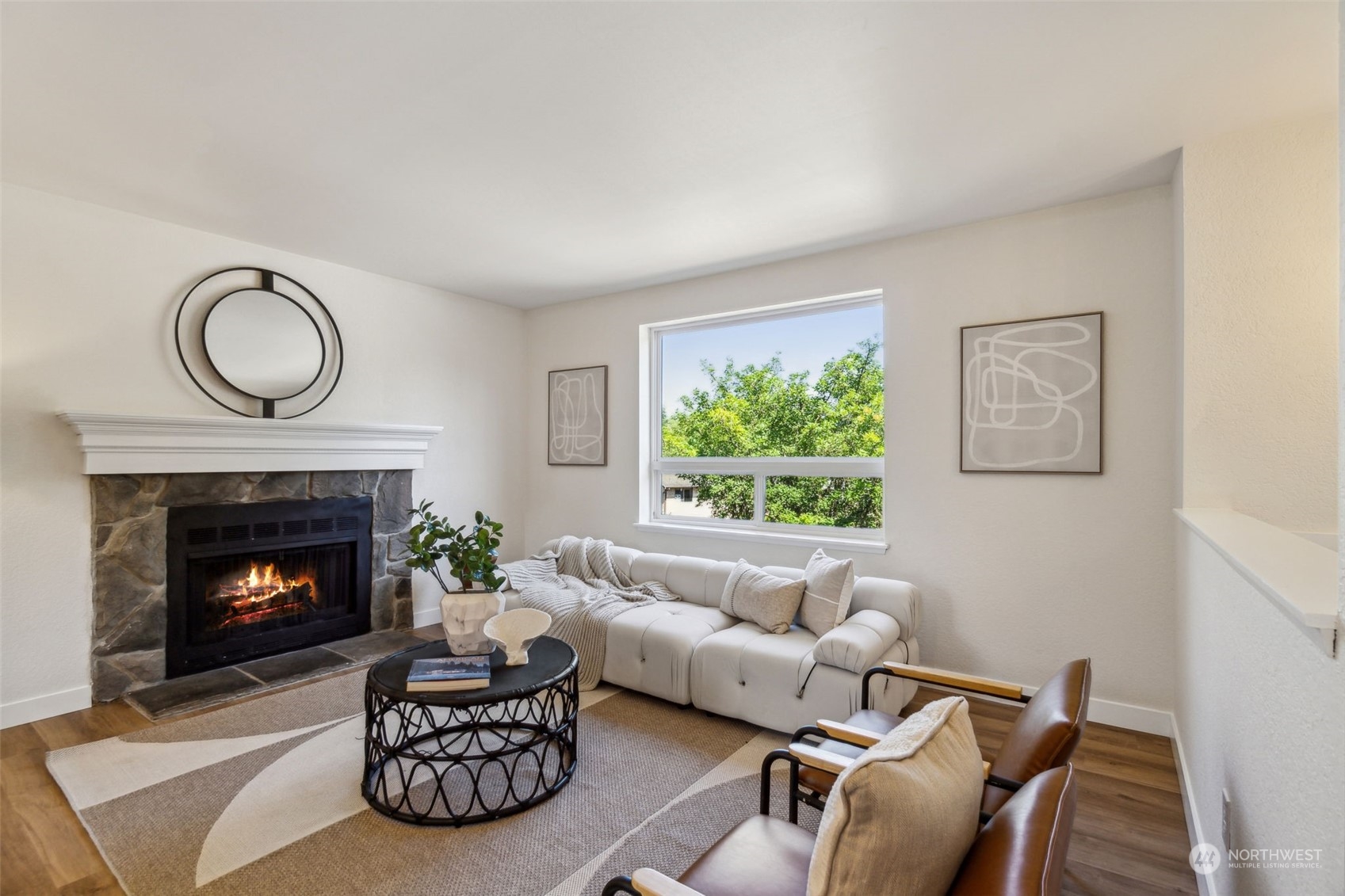1901 Northeast 17th Place Renton, WA 98056 - Photo 2 of 40 a living room with furniture a window and a fireplace