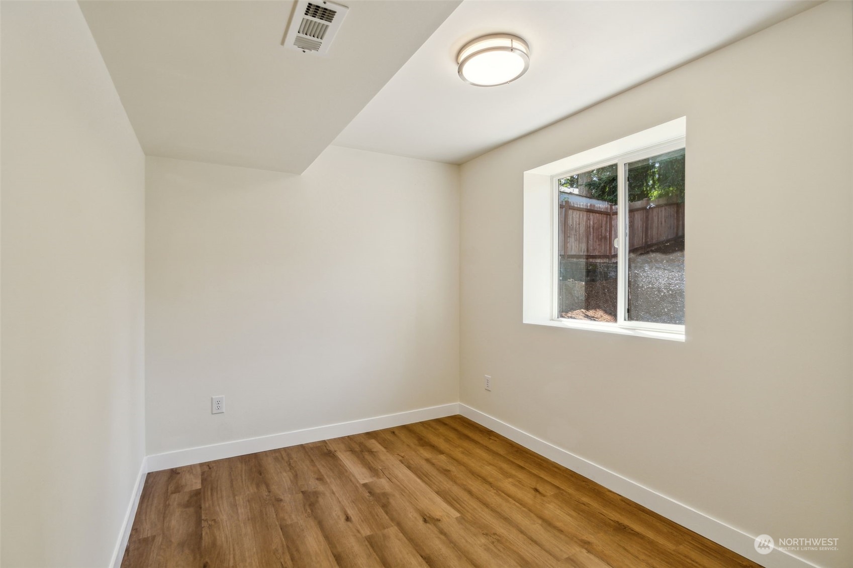 1901 Northeast 17th Place Renton, WA 98056 - Photo 27 of 40 an empty room with a window