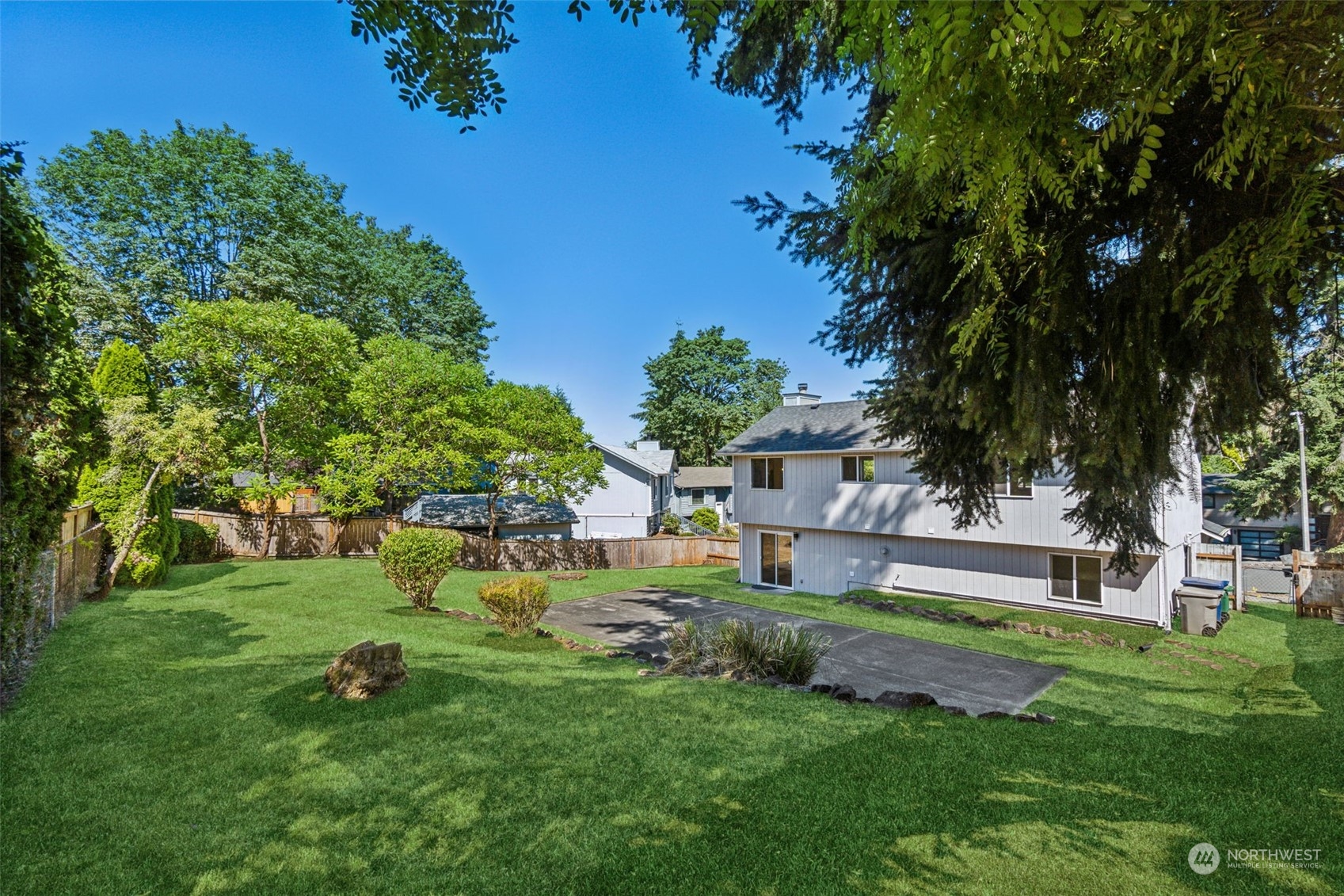 1901 Northeast 17th Place Renton, WA 98056 - Photo 36 of 40 a view of house with a backyard