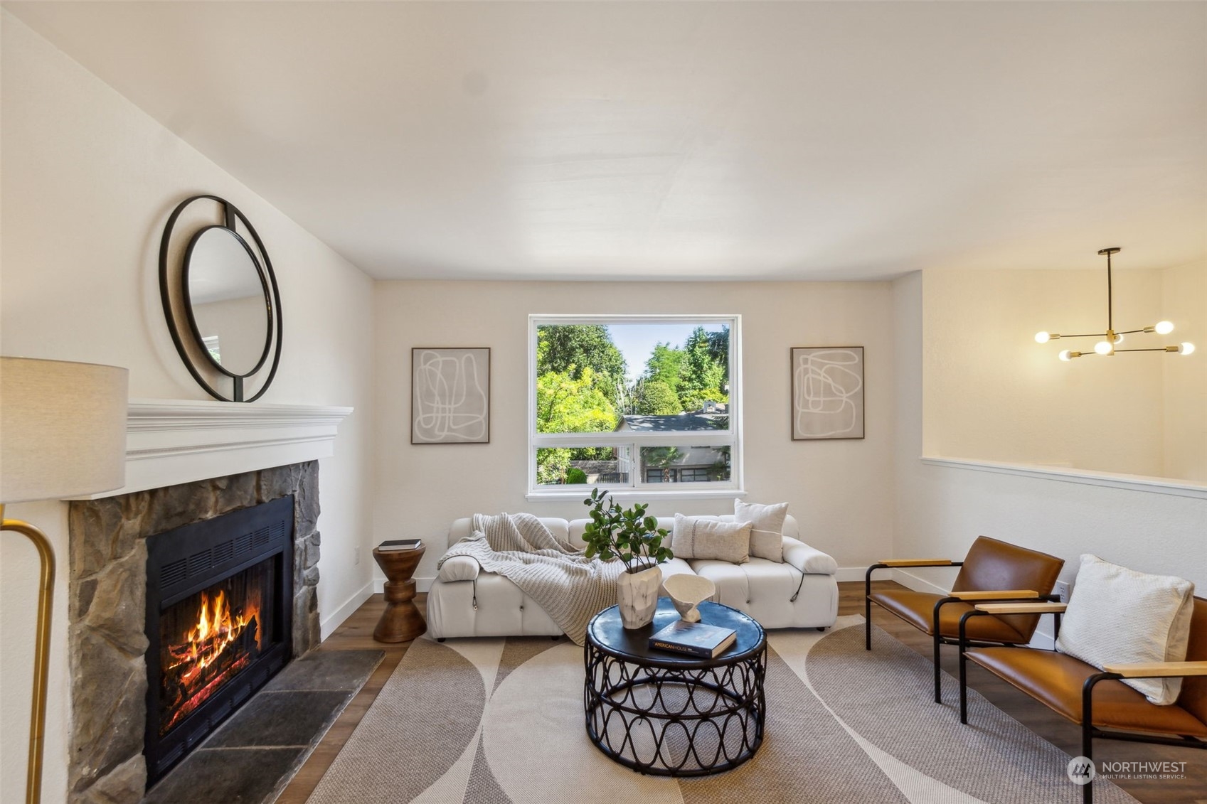 1901 Northeast 17th Place Renton, WA 98056 - Photo 5 of 40 a living room with furniture and a fireplace