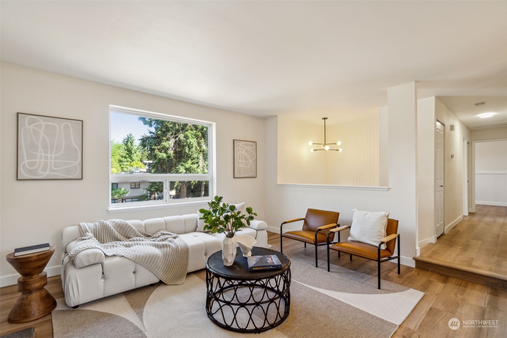 1901 Northeast 17th Place Renton, WA 98056 - Photo 6 of 40 a living room with furniture and a large window