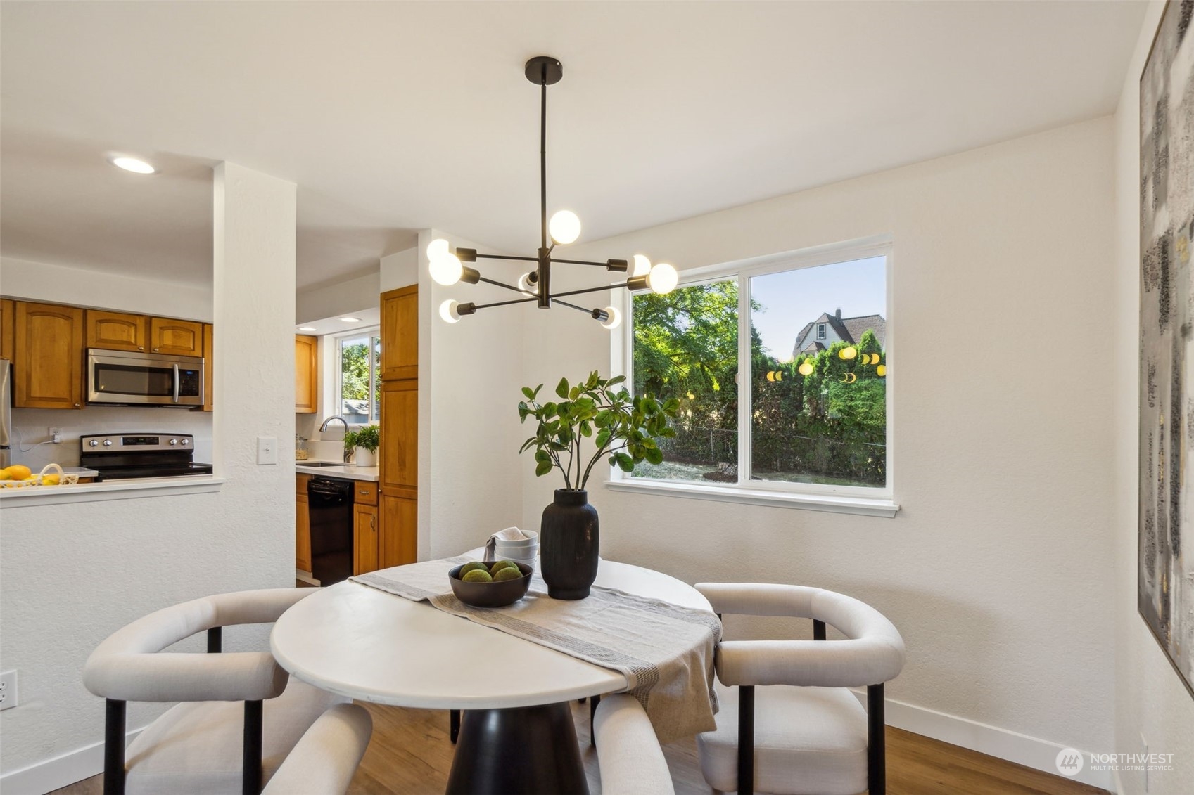 1901 Northeast 17th Place Renton, WA 98056 - Photo 7 of 40 a view of a dining room with furniture window and outside view