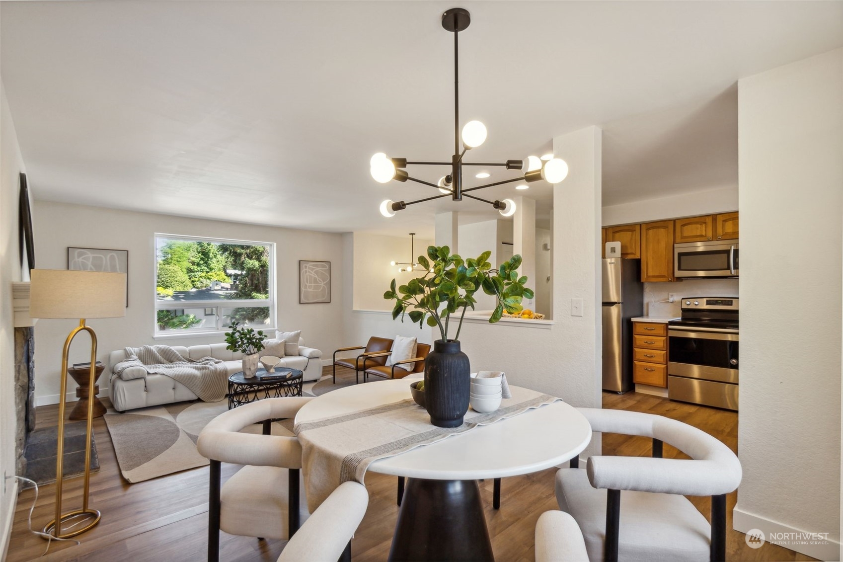 1901 Northeast 17th Place Renton, WA 98056 - Photo 8 of 40 a view of a dining room with furniture window and outside view