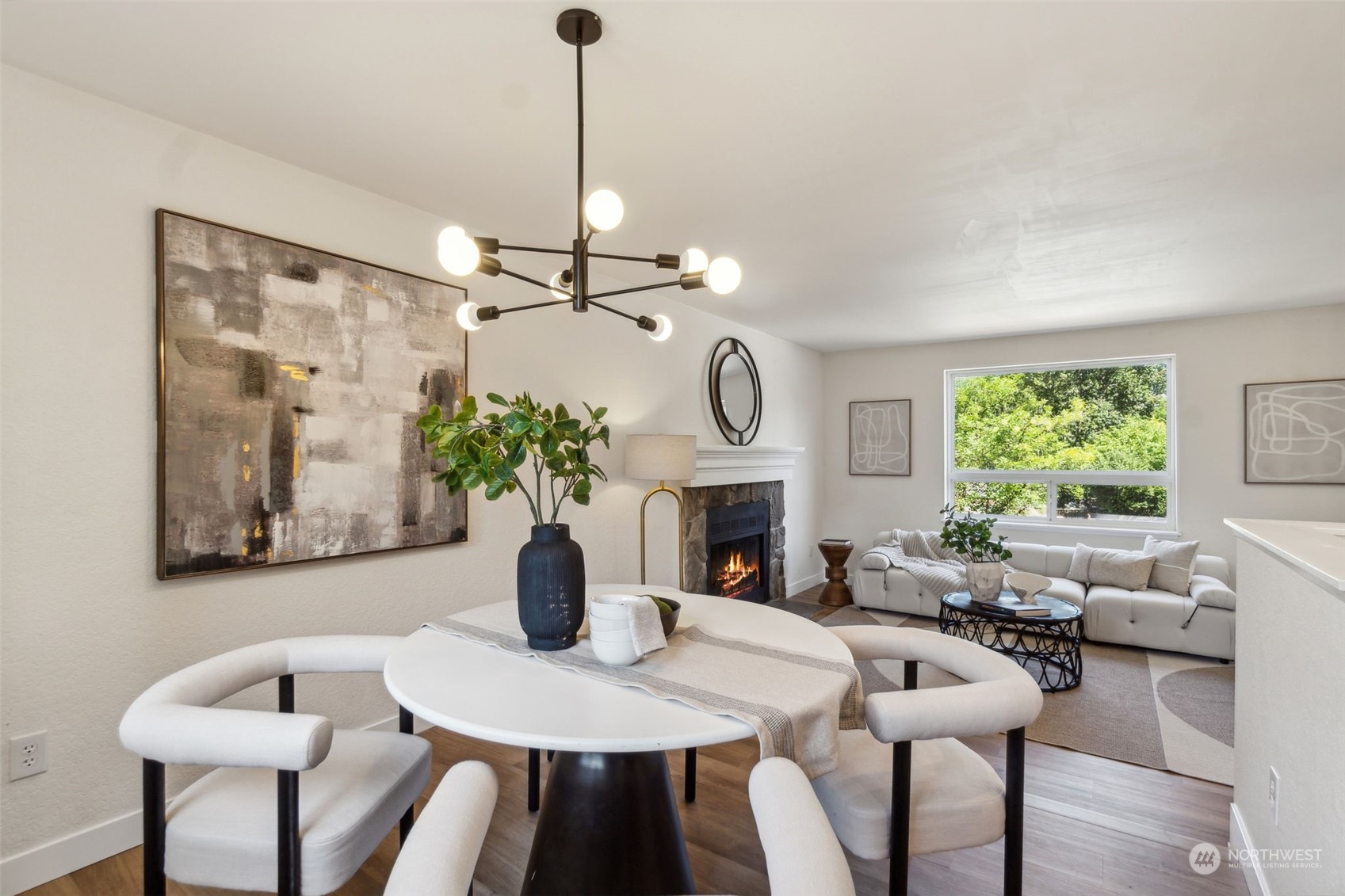 1901 Northeast 17th Place Renton, WA 98056 - Photo 9 of 40 a view of a dining room with furniture window and wooden floor