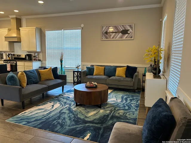 a living room with furniture and a couch