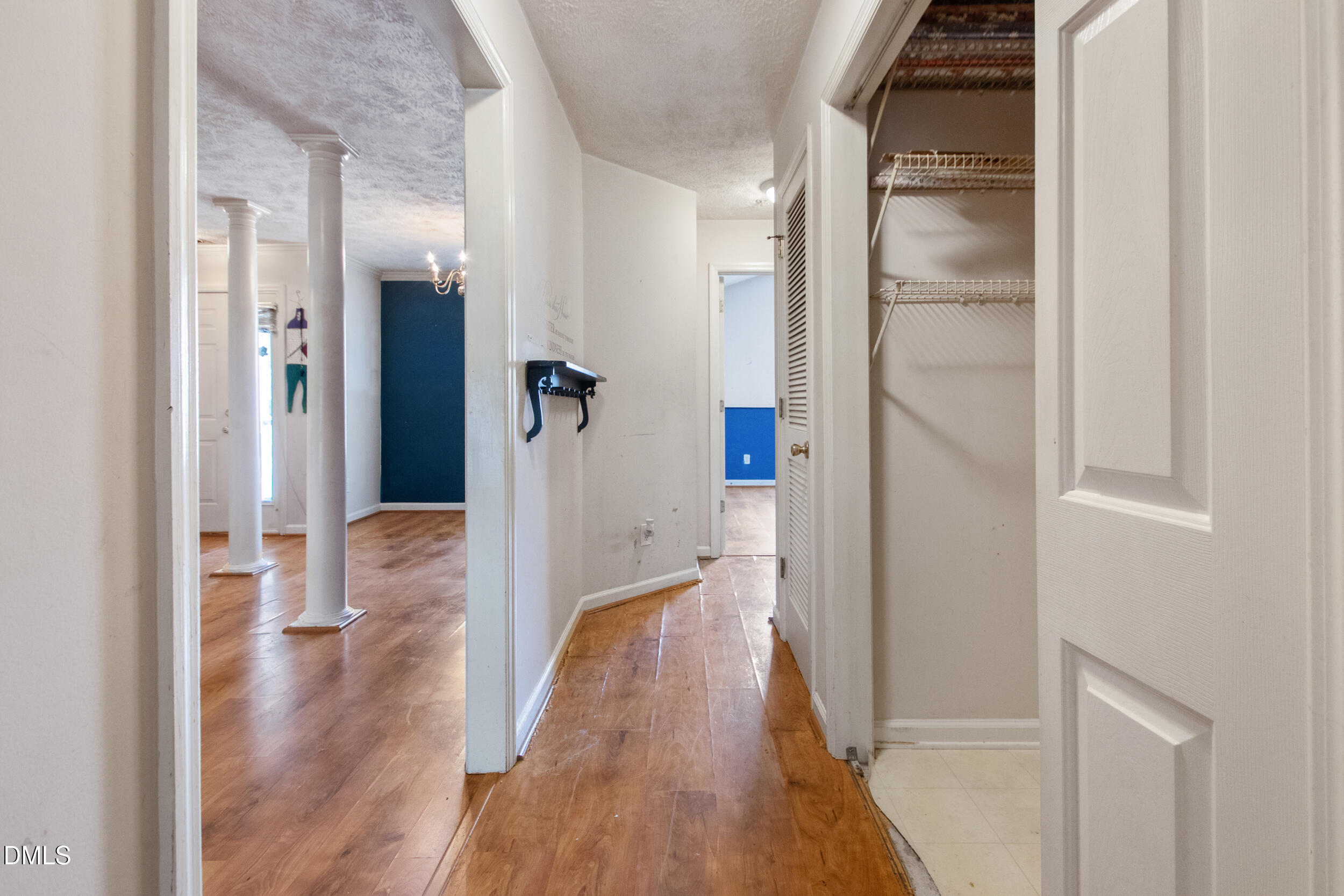 340 Bubble Creek Court, Unit 11 Fayetteville, NC 28311 - Photo 12 of 28 a view of a hallway with wooden floor