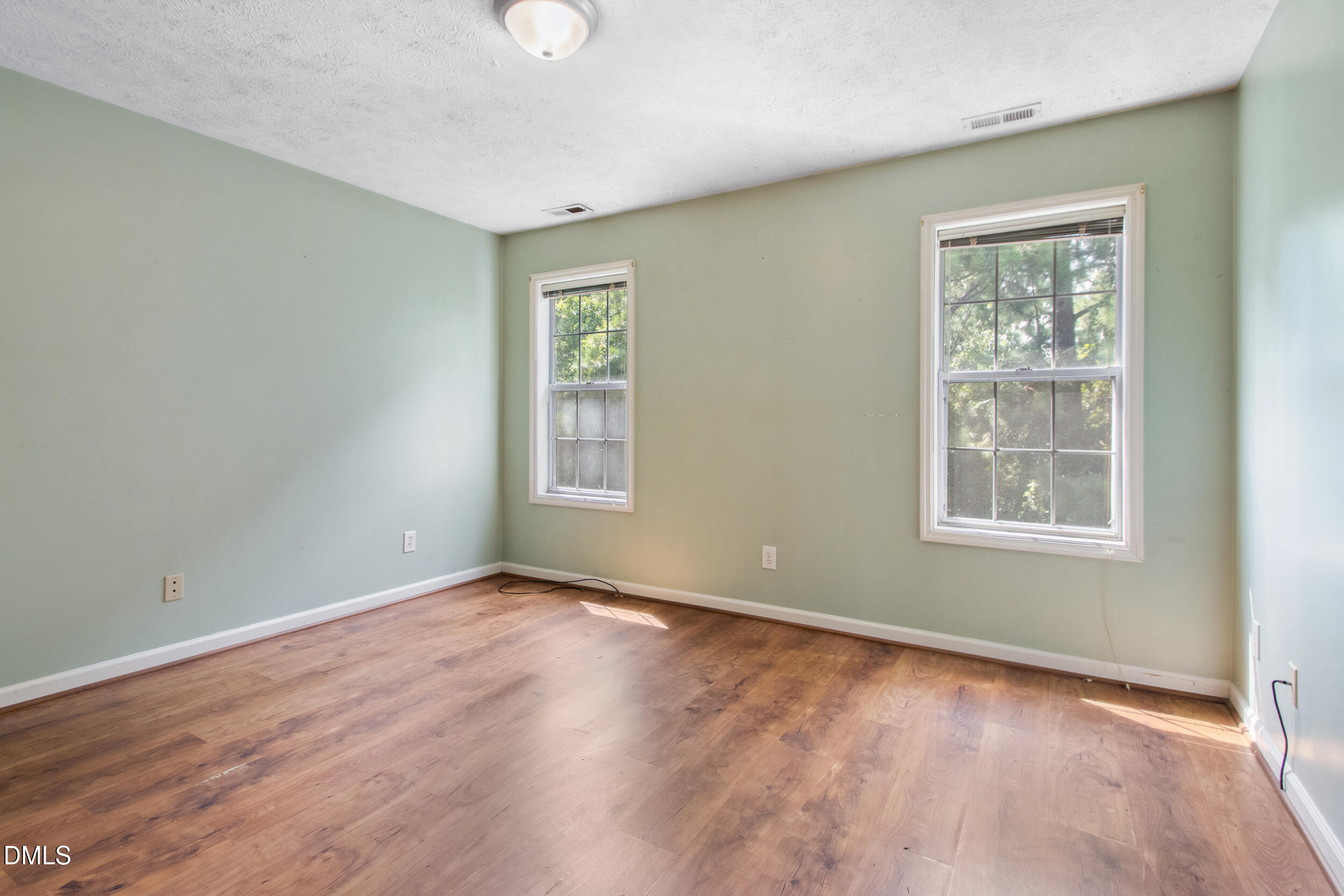 340 Bubble Creek Court, Unit 11 Fayetteville, NC 28311 - Photo 16 of 28 an empty room with windows