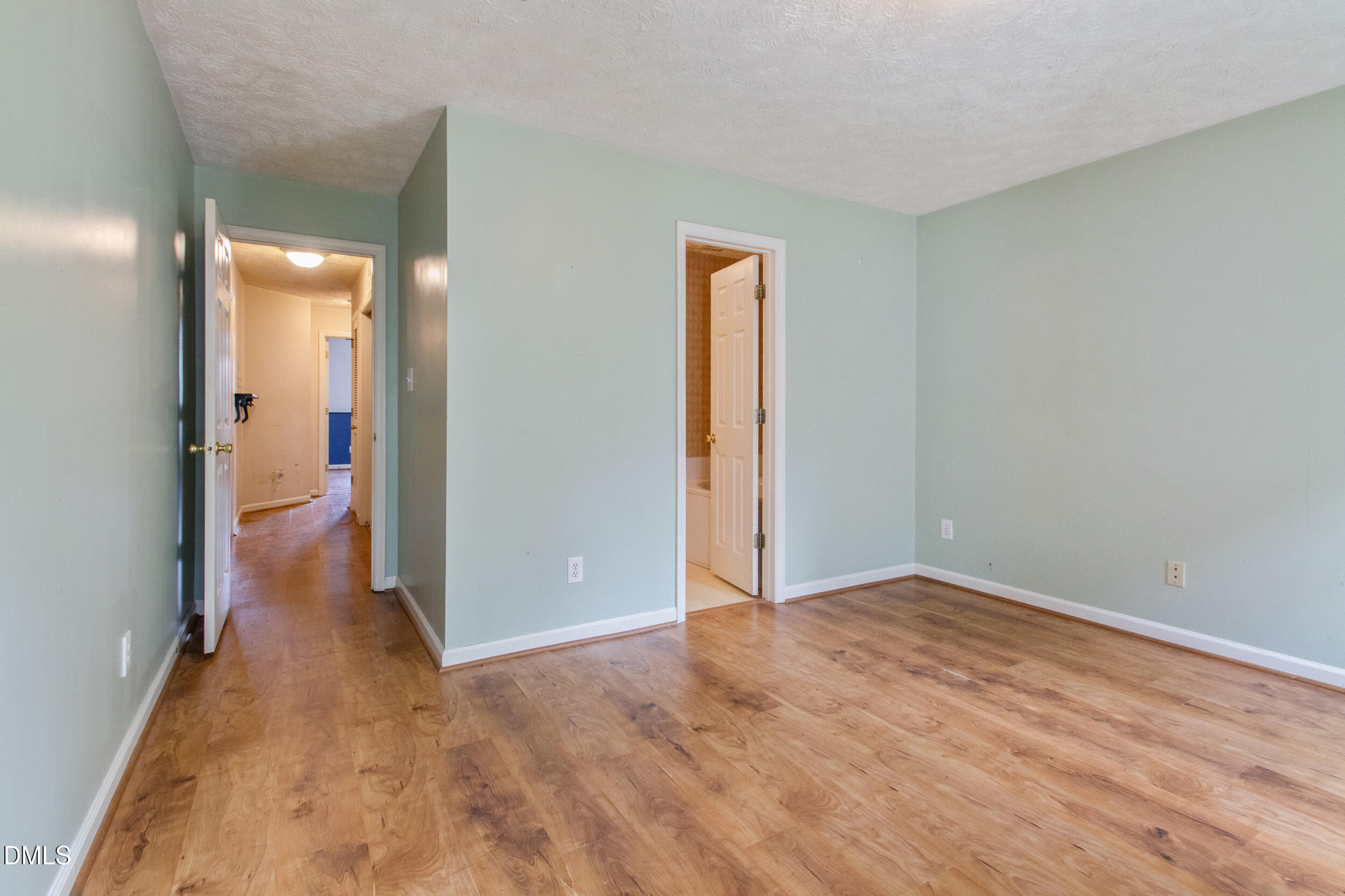340 Bubble Creek Court, Unit 11 Fayetteville, NC 28311 - Photo 18 of 28 a view of a room with wooden floor