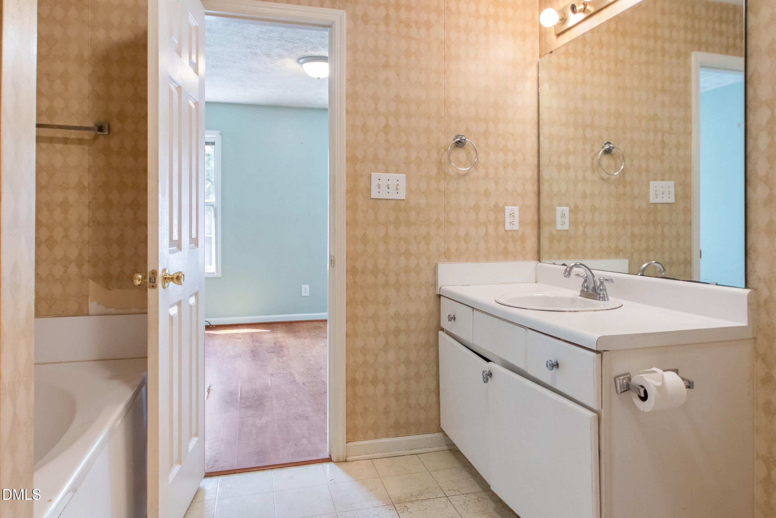 340 Bubble Creek Court, Unit 11 Fayetteville, NC 28311 - Photo 20 of 28 a bathroom with a double vanity sink and mirror
