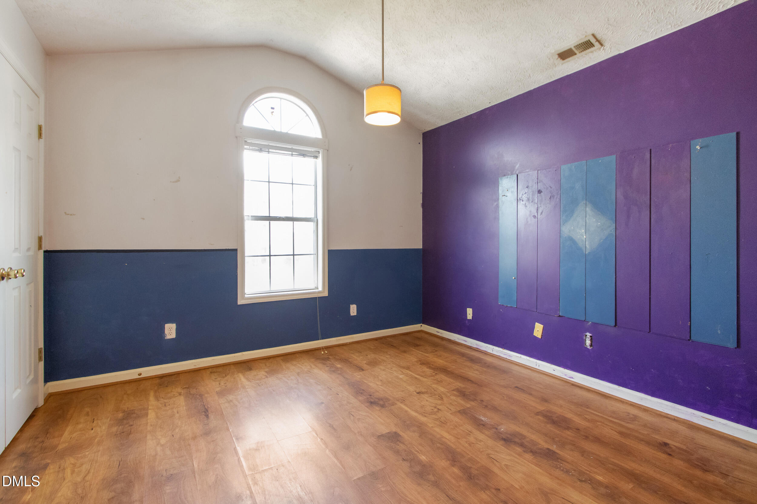 340 Bubble Creek Court, Unit 11 Fayetteville, NC 28311 - Photo 22 of 28 a view of empty room with window and chandelier