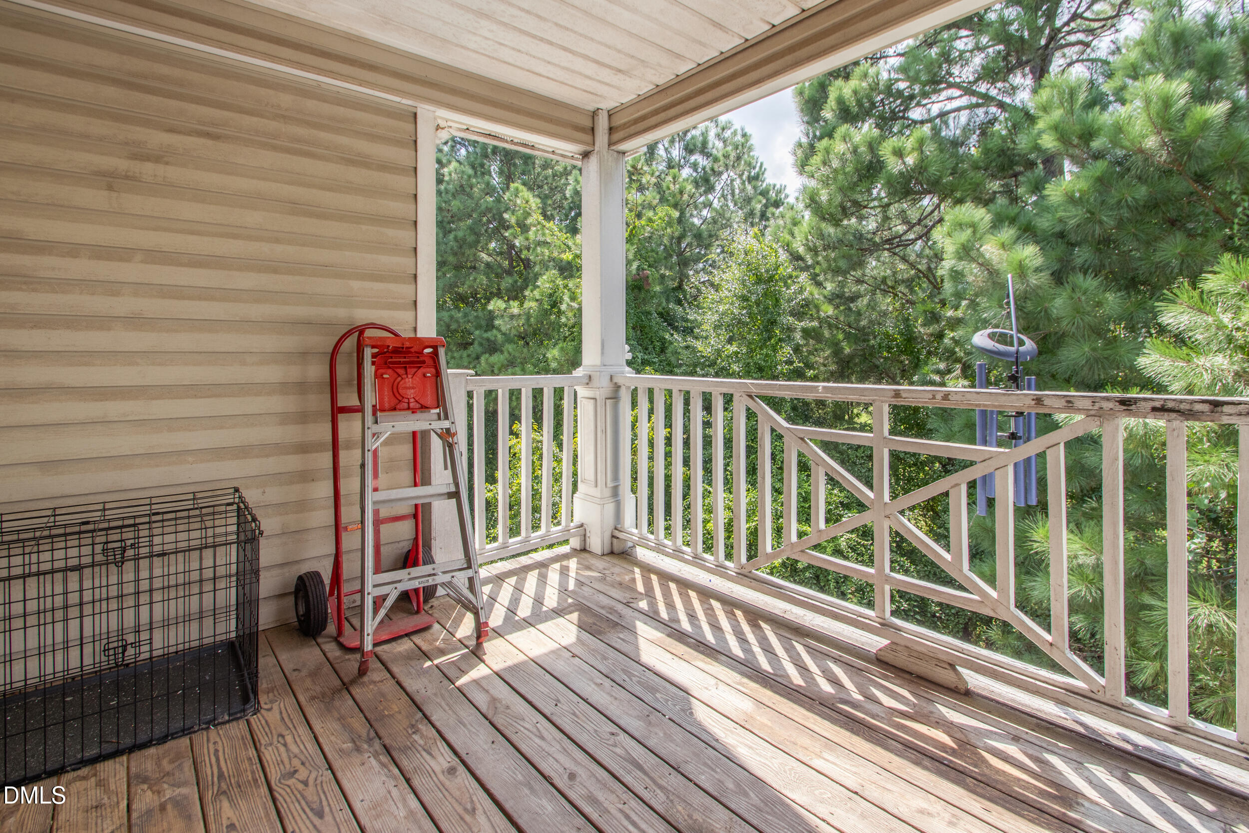 340 Bubble Creek Court, Unit 11 Fayetteville, NC 28311 - Photo 26 of 28 a view of balcony with wooden floor and fence