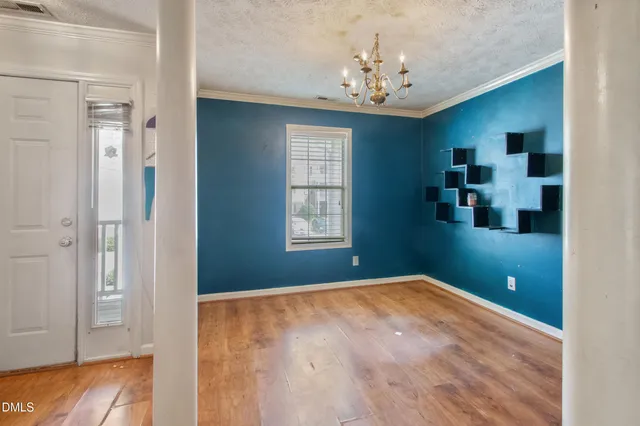 a view of a bathroom from a hallway