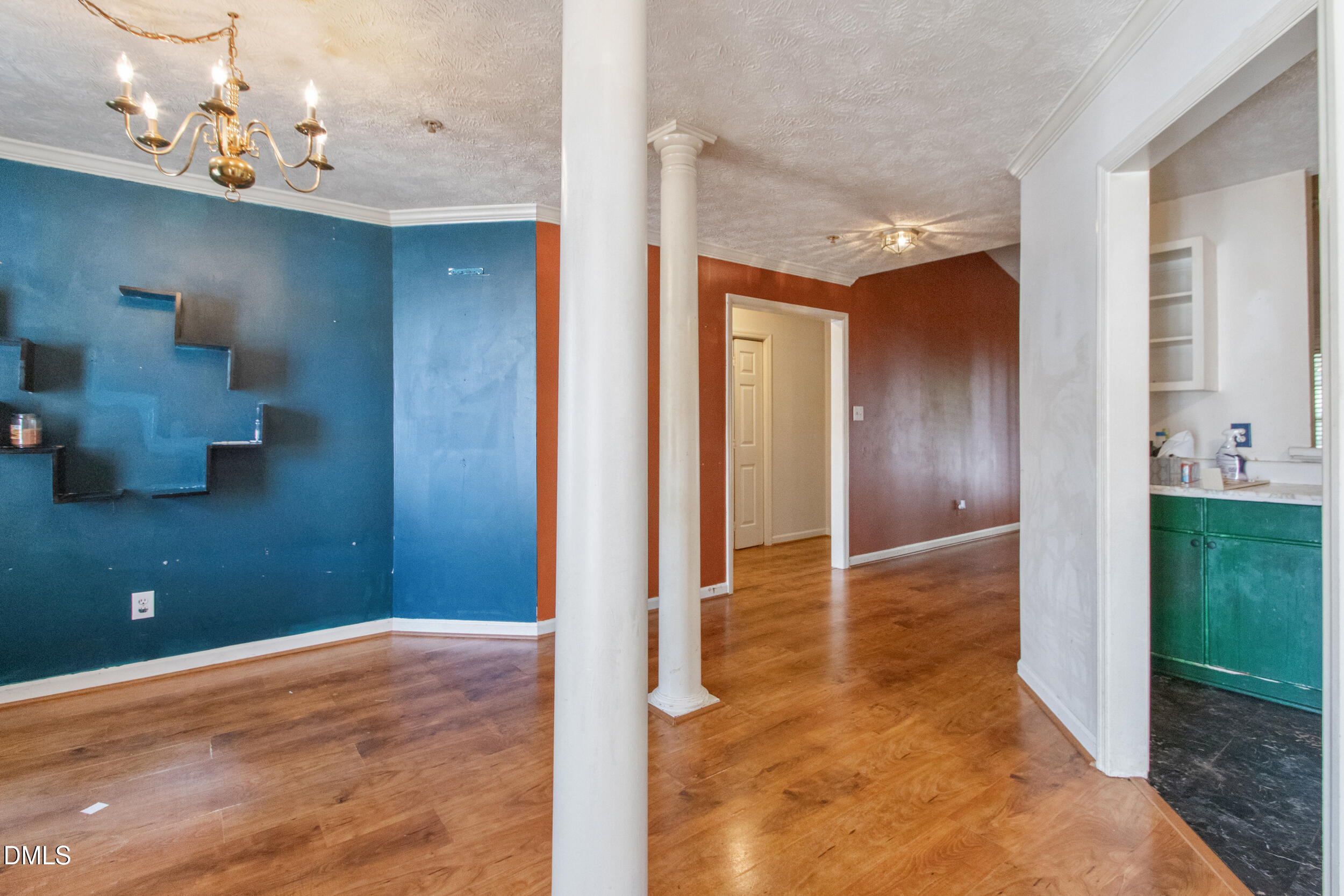 340 Bubble Creek Court, Unit 11 Fayetteville, NC 28311 - Photo 6 of 28 a view of a room with wooden floor and cabinet