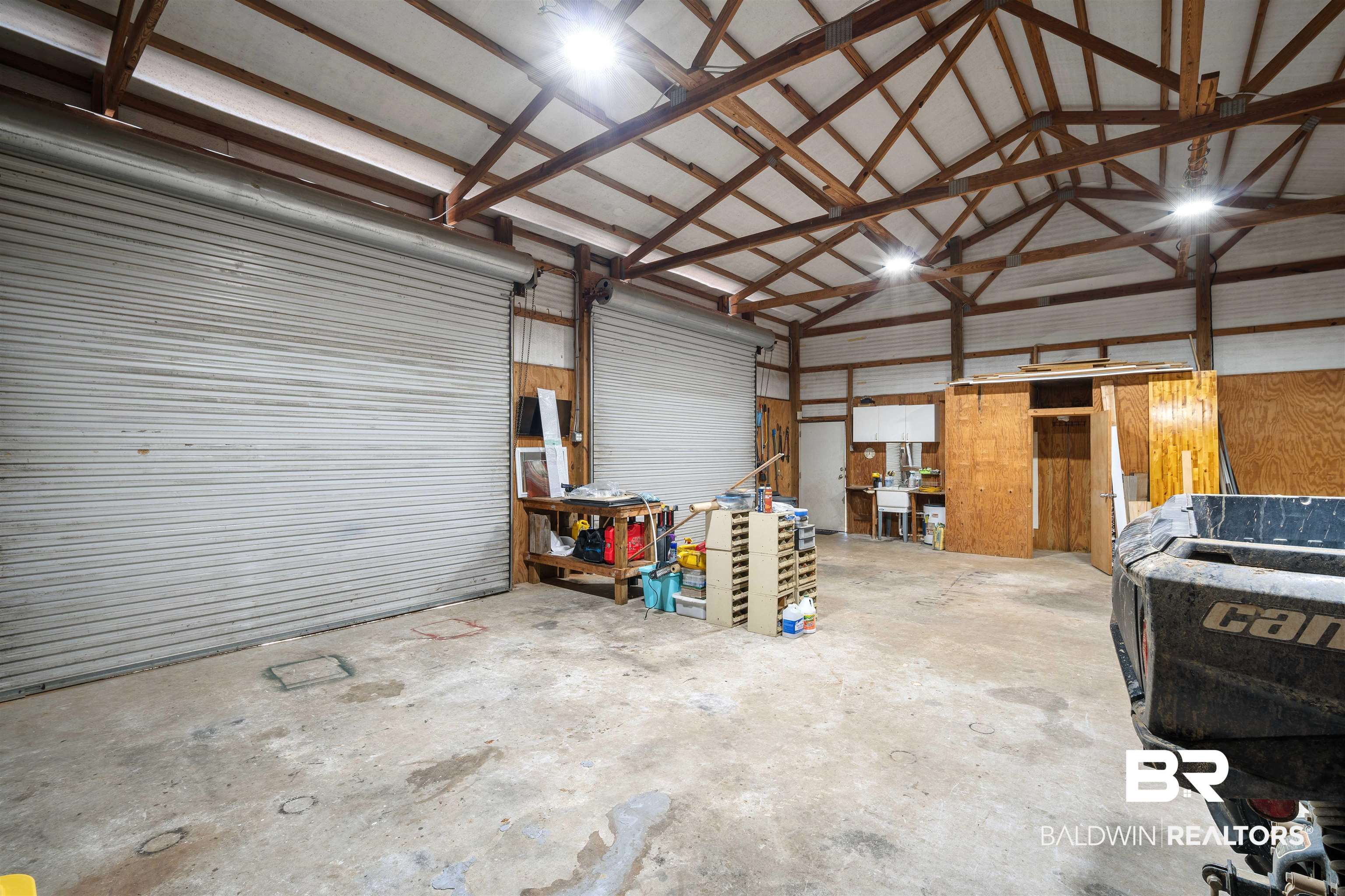 9011 Wilmer Georgetown Road Wilmer, AL 36587 - Photo 31 of 34 Garage featuring metal wall