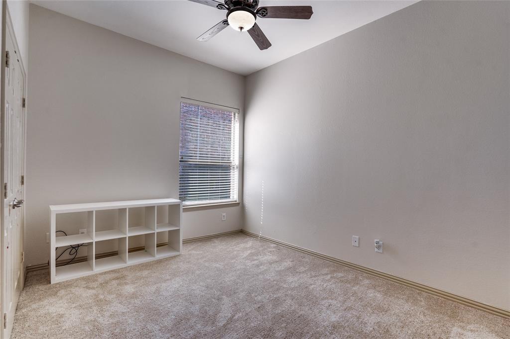 1804 Goodnight Lane Allen, TX 75002 - Photo 24 of 35 Spare room with ceiling fan and light carpet