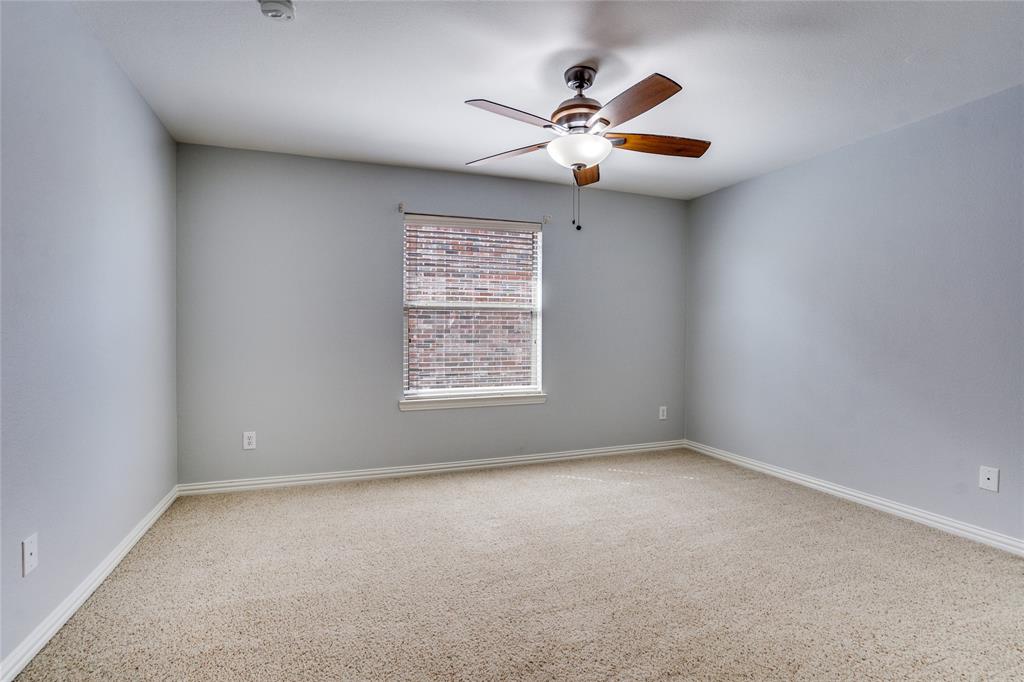 1804 Goodnight Lane Allen, TX 75002 - Photo 28 of 35 Spare room featuring light carpet and ceiling fan