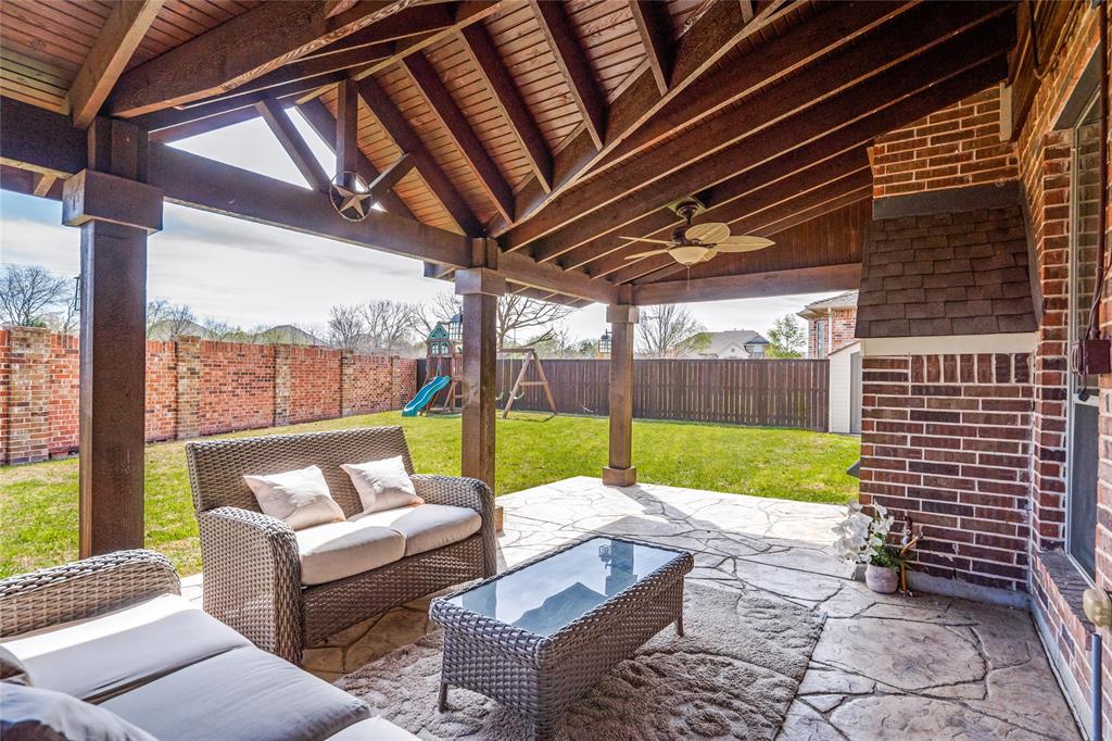 1804 Goodnight Lane Allen, TX 75002 - Photo 34 of 35 Fenced backyard featuring a playground, outdoor furniture, a patio, and ceiling fan