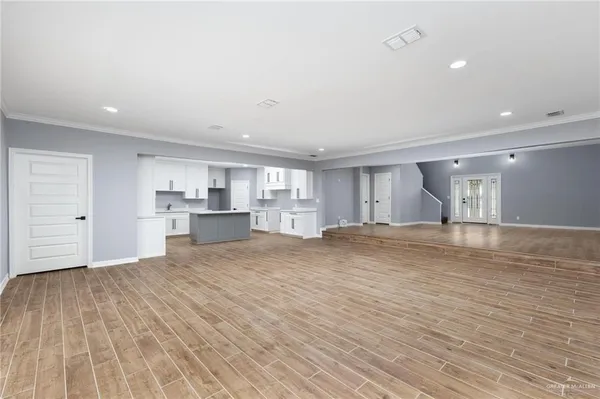 a view of kitchen with wooden floor